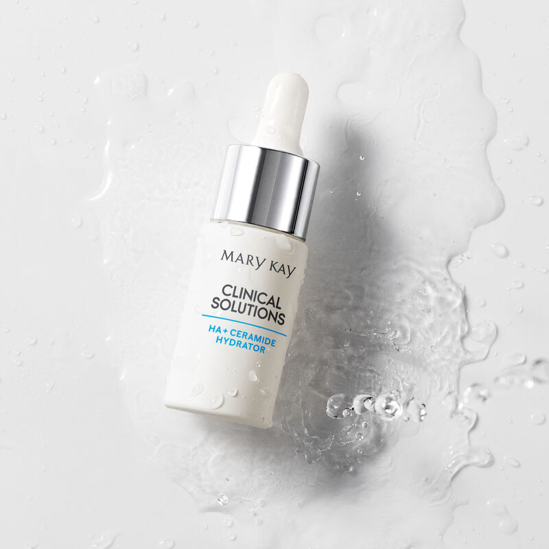 Closed bottle of Mary Kay Clinical Solutions&trade; HA + Ceramide Hydrator drenched in liquid