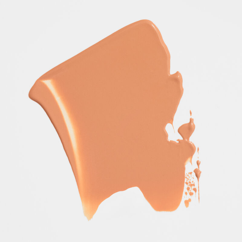 An aesthetic rub of Mary Kay&reg; Undereye Corrector in light peach