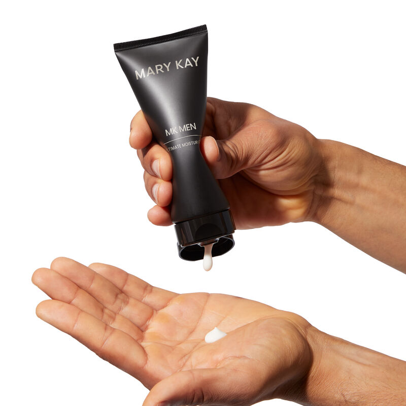 MKMen Ultimate Moisturizer being squeezed into the palm of a man&rsquo;s hand