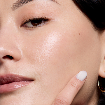 Up-close of a model showing off her strong skin barrier