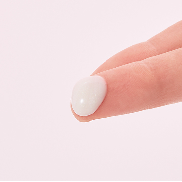 Mary Kay Vitamin C+E Serum product on finger